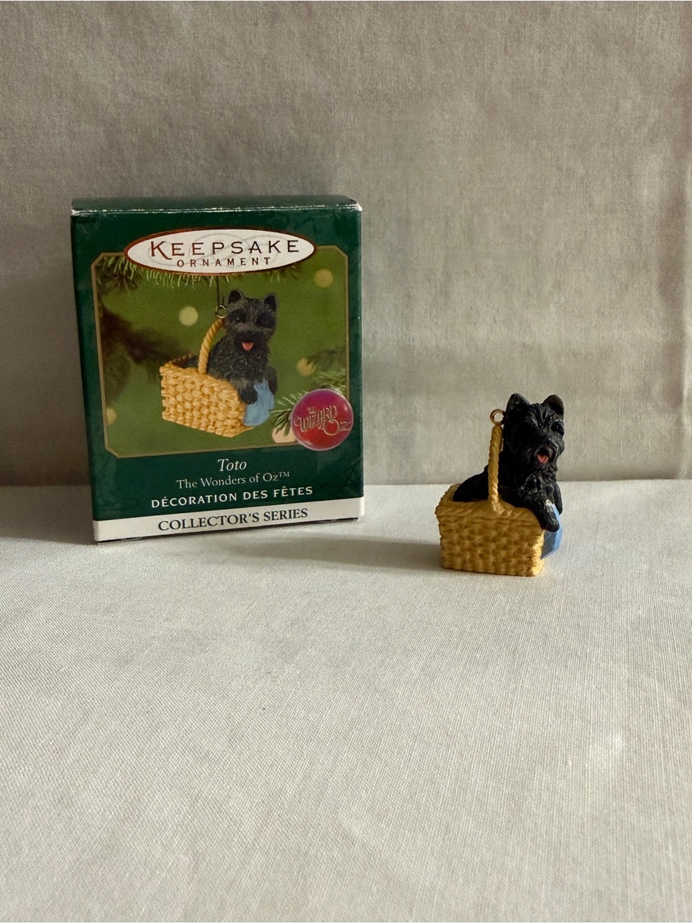 Hallmark Black Toto in Tan Basket with Blue Blanket Ornament